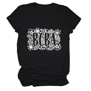 Close-up of floral BCBA print on black cotton T-shirt showing intricate line art