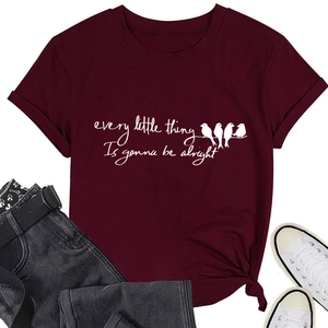Detail of burgundy T-shirt with birds on wire and every little thing print
