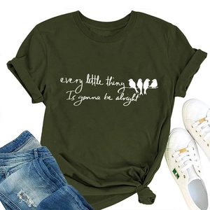 Flat lay of army green cotton t-shirt featuring every little thing print and bird artwork