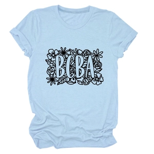 Detail of BCBA floral print on light blue cotton t-shirt with minimalist crew neck design