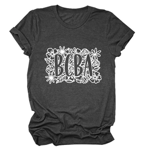 Dark grey crew neck T-shirt with white BCBA floral print in flat lay view