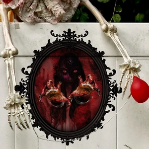 Gothic mirror frame with creepy red-eyed ghost and skeleton hands for Halloween decor