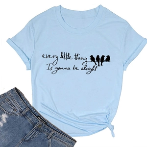 Detail of light blue cotton T-shirt with side knot and black artistic slogan print