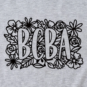 Women's grey T-shirt featuring BCBA lettering with black floral line art patterns