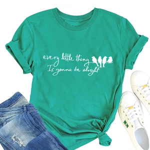 Detail of green T-shirt with birds print and every little thing is gonna be alright text