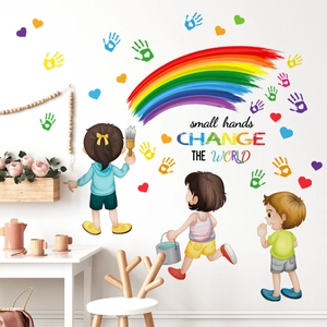Colorful kids rainbow wall decal with handprints and motivational quote for playroom