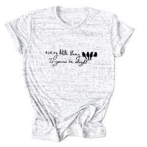 Detail of grey heather t-shirt featuring birds silhouette and motivational print