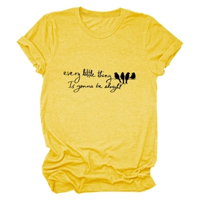 Close-up of yellow cotton t-shirt with every little thing letter print and birds