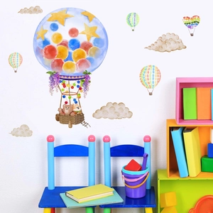 Detail showing Nordic cartoon hot air balloon and animal wall decals in kids room