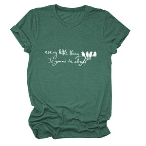 Detail of dark green t-shirt with bird silhouette and inspirational text print