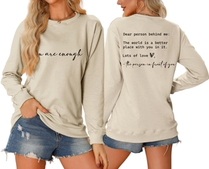 Front and back view of beige crewneck sweatshirt with 'you are enough' inspirational text