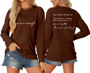 Front and back view of brown crewneck sweatshirt featuring white you are enough text