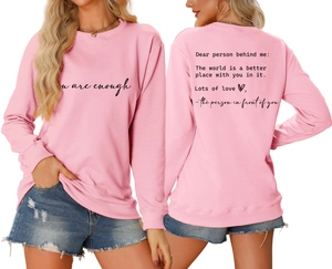 Pink crewneck sweatshirt with 'you are enough' slogan print showing front and back view
