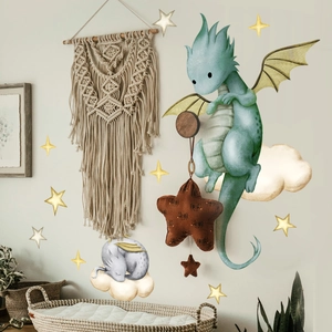 Detail of cartoon dragon wall stickers with watercolor clouds and stars in a nursery room
