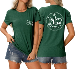 Detail of dark green t-shirt showing front and back Sisters Trip 2025 graphic print