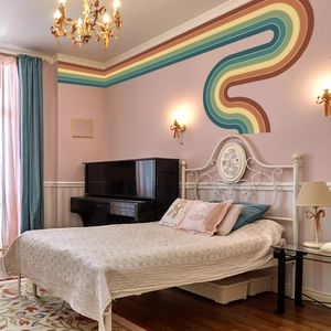 Bohemian large rainbow wall sticker for nursery decor on a soft pink bedroom wall