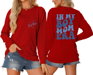 Detail of blue In My Boy Mom Era vintage print on red cotton long sleeve sweatshirt