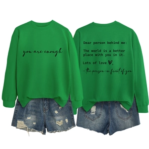 Detail of green long-sleeve sweatshirt with Dear person behind me inspirational text back