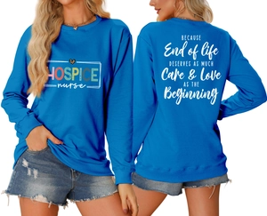 Detailed front and back view of blue hospice nurse sweatshirt with colorful gradient text