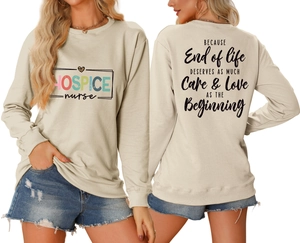 Front and back view of beige hospice nurse sweatshirt with colorful leopard heart print