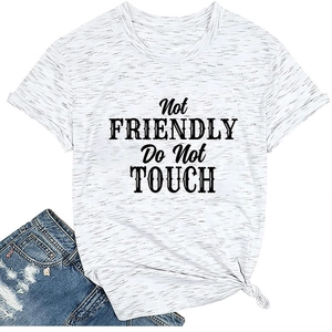 Detail of grey slogan t-shirt showing knotted hem and 'Not Friendly' bold graphic