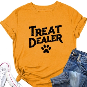 Detail view of mustard yellow crew neck tee with TREAT DEALER print and rolled sleeve hem