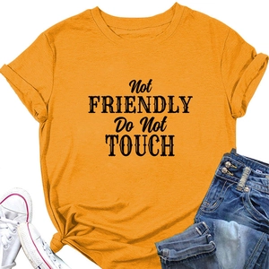 Flat lay of yellow cotton T-shirt with 'Not FRIENDLY Do Not TOUCH' bold slogan print