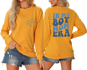 Detailed front and back view of yellow sweatshirt with blue Boy Mom Era prints