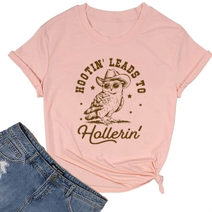 Detail of pink cotton T-shirt featuring a retro cowboy owl print and side knot design