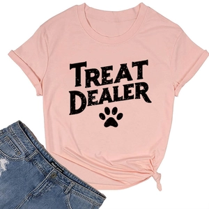 Close-up of pink casual t-shirt with Treat Dealer print and side knot detail