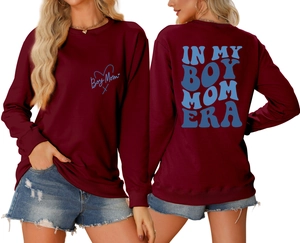 Detailed front and back view of burgundy sweatshirt with blue In My Boy Mom Era prints
