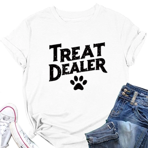 Flat lay of white cotton T-shirt with TREAT DEALER print and cute paw motif detail
