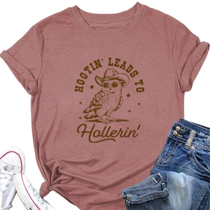 Detail of owl graphic print with cowboy hat and sunglasses on short sleeve t-shirt