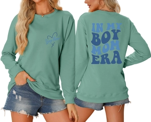 Detailed front and back view of sage green sweatshirt with In My Boy Mom Era slogan