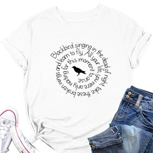 Flat lay of white cotton crew neck T-shirt featuring blackbird lyrics and graphic design