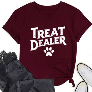 Detail of burgundy cotton crewneck T-shirt with Treat Dealer print and canine paw icon