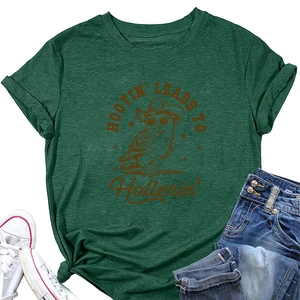 Flat lay of a heather green T-shirt with a hootin' owl print and denim shorts