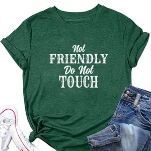 Detail of dark green t-shirt with Not Friendly print and side knot on the hem