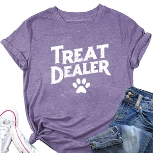Flat lay of purple short sleeve t-shirt with Treat Dealer print and side knot detail
