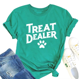 Detailed flat lay of turquoise round neck t-shirt with treat dealer text and pet paw print