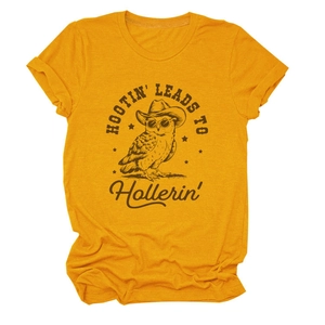 Detail of cotton yellow T-shirt with vintage owl graphic and Hootin' Leads To text