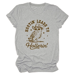 Detail of grey crewneck tee featuring vintage owl print and retro lettering texture