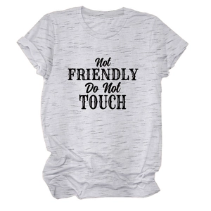 Detail of grey crewneck T-shirt showing rolled cuffs and Not Friendly text print