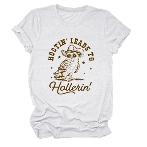 White cotton T-shirt featuring a western owl graphic with rolled cuffs and a relaxed fit