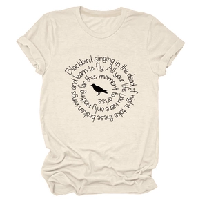 Detail of beige crew neck T-shirt with circular bird graphic and lyric print