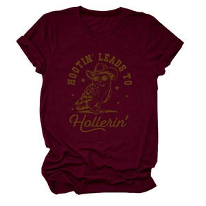 Detail of maroon crewneck T-shirt featuring retro owl graphic and soft cotton texture