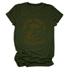 Detail view of cotton texture with hootin leads to hollerin owl print on dark green t-shirt
