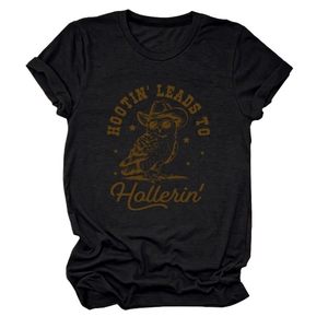 Detail of black cotton T-shirt featuring retro owl print and Hootin' slogan
