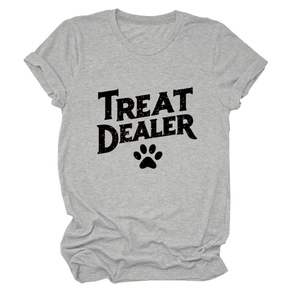 Detailed close-up of grey short-sleeve T-shirt featuring Treat Dealer text and paw print