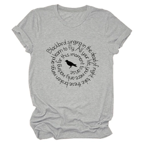 Close-up of crew neck t-shirt with black bird silhouette and lyrics print on grey marl